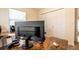 Office space featuring dark stained desk, neutral colored walls and a window with natural light at 2309 6Th Ave, Deland, FL 32724