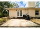 An outdoor patio offers a perfect place for relaxing or outdoor dining at 2309 6Th Ave, Deland, FL 32724