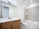 Bathroom with a shower/tub combo and a wood vanity with quartz countertops at 234 Mosaic Blvd, Daytona Beach, FL 32124