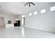 Spacious living area, with tile floors, open layout, and ample natural light from multiple windows at 234 Mosaic Blvd, Daytona Beach, FL 32124
