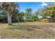 Large backyard with trees and privacy fence at 2524 Anastasia Dr, South Daytona, FL 32119