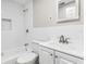 Clean bathroom featuring a white subway tile shower and tub combo, along with a modern vanity at 2524 Anastasia Dr, South Daytona, FL 32119