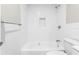 Clean bathroom featuring a shower/tub and white subway tile at 2524 Anastasia Dr, South Daytona, FL 32119