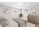Stylishly furnished bedroom featuring two windows with plenty of natural light and closet space at 2524 Anastasia Dr, South Daytona, FL 32119