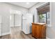 Bright kitchen area showcasing modern appliances, ample storage, and an adjacent dining area at 2524 Anastasia Dr, South Daytona, FL 32119