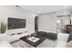 Open-concept living area featuring modern decor, seamless flooring, and ample natural light at 2524 Anastasia Dr, South Daytona, FL 32119