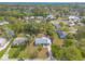 Aerial perspective of the property, highlighting its location within a leafy residential area at 2605 Fairmont Ave, New Smyrna Beach, FL 32168