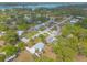 Quiet residential street lined with mature trees and well-kept single-Gathering homes at 2605 Fairmont Ave, New Smyrna Beach, FL 32168