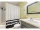 Neat bathroom featuring a shower-tub combination, and a single sink vanity at 2605 Fairmont Ave, New Smyrna Beach, FL 32168