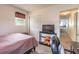 Bedroom with a bed, closet, and TV at 2605 Fairmont Ave, New Smyrna Beach, FL 32168