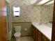 Neutral bathroom featuring a tiled shower/tub, and a full-length vanity with a solid surface countertop at 26225 Troon Ave, Mount Plymouth, FL 32776
