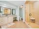 Stylish bathroom with walk-in shower and dual sinks, offering a spa-like experience at 2855 S Atlantic Ave # 303, Daytona Beach Shores, FL 32118