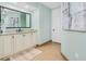 Beautiful bathroom features a neutral color palette, granite countertop, vanity, and decor at 2855 S Atlantic Ave # 303, Daytona Beach Shores, FL 32118