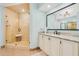 Elegant bathroom with glass enclosed shower, granite countertop, and modern fixtures at 2855 S Atlantic Ave # 303, Daytona Beach Shores, FL 32118