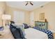 Cozy bedroom with coordinated decor, twin beds, and a cabinet perfect for storage and style at 2855 S Atlantic Ave # 303, Daytona Beach Shores, FL 32118