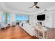 Open living room with ocean view, comfortable seating, and modern decor at 2855 S Atlantic Ave # 303, Daytona Beach Shores, FL 32118