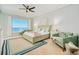 Bright main bedroom featuring ocean views, comfortable seating, and stylish coastal decor at 2855 S Atlantic Ave # 303, Daytona Beach Shores, FL 32118