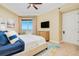 This is a beautiful primary bedroom with great natural light and a beautiful balcony with ocean views at 2855 S Atlantic Ave # 303, Daytona Beach Shores, FL 32118