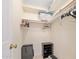 Walk-in closet featuring shelving and a shoe rack for optimal organization at 2900 N Atlantic Ave # 2003, Daytona Beach, FL 32118