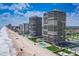 Picturesque exterior captures condo towers by the beach, highlighting luxurious coastal living with easy access to the ocean at 2900 N Atlantic Ave # 2003, Daytona Beach, FL 32118
