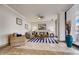 Bright living room with nautical decor, tile floors, and access to the building's beach-facing balcony at 2900 N Atlantic Ave # 2003, Daytona Beach, FL 32118