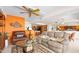 Bright living area showcases an open floor plan with comfortable seating and beach-themed decor at 2900 N Atlantic Ave # 2003, Daytona Beach, FL 32118