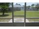 Spacious backyard viewed from the screened-in patio at 2936 Lantern Dr, South Daytona, FL 32119