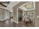 Formal dining room featuring stylish lighting, elegant furnishings, and access to additional living spaces at 302 Lamberton Ln, Deland, FL 32724