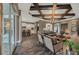 Open-concept living area with view of modern kitchen and outdoor patio at 302 Lamberton Ln, Deland, FL 32724