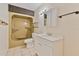 Bathroom with vanity, shower, and built in storage at 303 E Floral Ave, Eustis, FL 32726