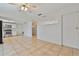 Bright living room with tile floors offers lots of natural light at 303 E Floral Ave, Eustis, FL 32726