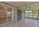 Screened patio with lots of light and an enclosed view at 303 E Floral Ave, Eustis, FL 32726