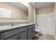 Bathroom featuring a double vanity with granite countertops, a bathtub and a toilet at 3120 Areca Ave, New Smyrna Beach, FL 32168