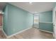 This spacious bedroom is filled with natural light and features luxury vinyl plank flooring at 3120 Areca Ave, New Smyrna Beach, FL 32168