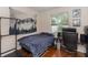 Comfortable bedroom features a blue theme, natural light, and a dedicated workspace at 316 Oak Springs Dr, Debary, FL 32713