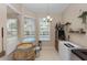 Poolside room features a wet bar, pool views, and natural light at 316 Oak Springs Dr, Debary, FL 32713