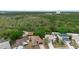 Aerial view of the neighborhood, highlighting the homes and surrounding greenery at 3267 Wild Pepper Ct, Deltona, FL 32725