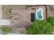Aerial view of the house with a private backyard pool, solar panels, and patio space at 3267 Wild Pepper Ct, Deltona, FL 32725