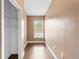 Bedroom closet with hardwood floors and a window at 3267 Wild Pepper Ct, Deltona, FL 32725