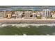 Beautiful aerial view of beachfront condos with pools, a sandy beach, and stunning oceanfront views at 3799 S Atlantic Ave # 601, Daytona Beach, FL 32118