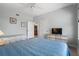 Bright and airy bedroom featuring twin beds, wood-look floors, and ample closet space at 3799 S Atlantic Ave # 601, Daytona Beach, FL 32118