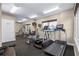 Community fitness center with workout equipment and natural light at 3799 S Atlantic Ave # 601, Daytona Beach, FL 32118