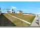 Spacious backyard with grass and access to the beach at 4363 S Atlantic Ave, Ponce Inlet, FL 32127