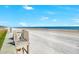 Direct beach access from the property, with a wooden deck overlooking the sand at 4363 S Atlantic Ave, Ponce Inlet, FL 32127
