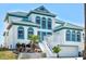 Beautiful two-story home with a two-car garage and tropical landscaping at 4363 S Atlantic Ave, Ponce Inlet, FL 32127