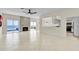 Spacious living room with a fireplace and sliding glass doors that open to breathtaking ocean views at 4363 S Atlantic Ave, Ponce Inlet, FL 32127