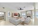 Cozy living room featuring comfortable seating, a fireplace, and an ocean view at 4363 S Atlantic Ave, Ponce Inlet, FL 32127