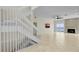 Spacious living room showcasing a fireplace and access to an outdoor balcony with ocean views at 4363 S Atlantic Ave, Ponce Inlet, FL 32127