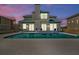 Backyard pool with multiple seating options and an enclosed patio, perfect for outdoor relaxation at 4363 S Atlantic Ave, Ponce Inlet, FL 32127