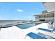 Beachside pool and patio area offers an ocean view, hot tub, and lounge chairs for ultimate relaxation at 4363 S Atlantic Ave, Ponce Inlet, FL 32127